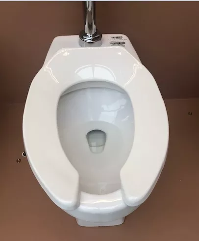 Asiento elongado  institucional para inodoro Fluxometro marca Ziax